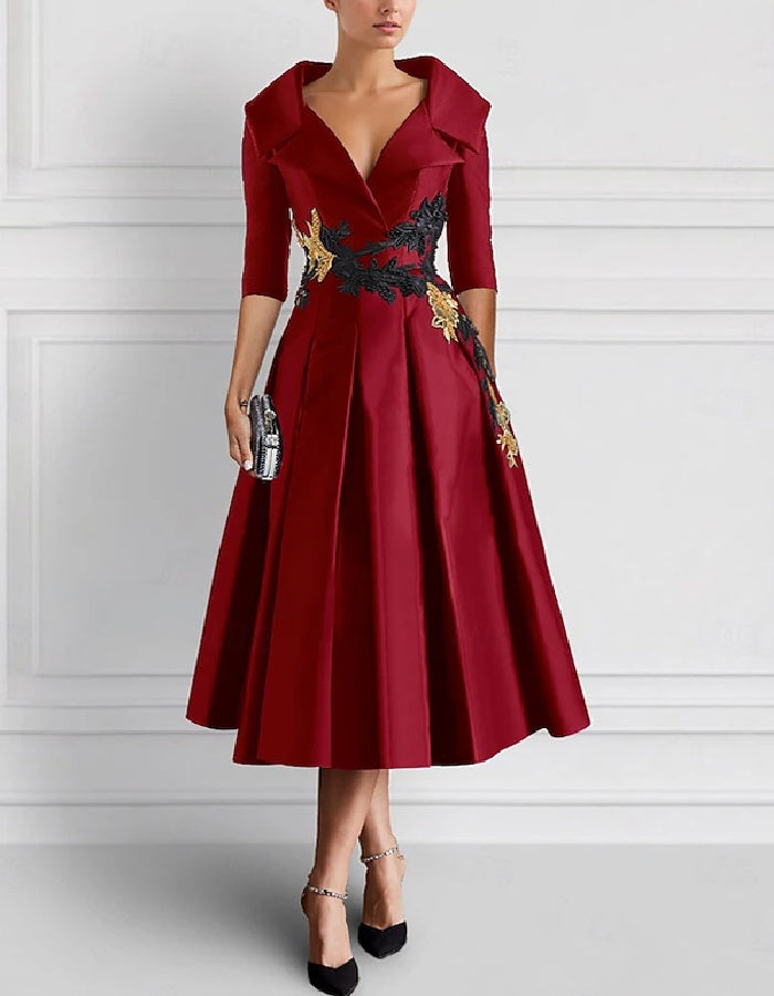 Elegant Satin Midi Dress with Embroidered Floral Appliqué and Folded Lapel Neckline