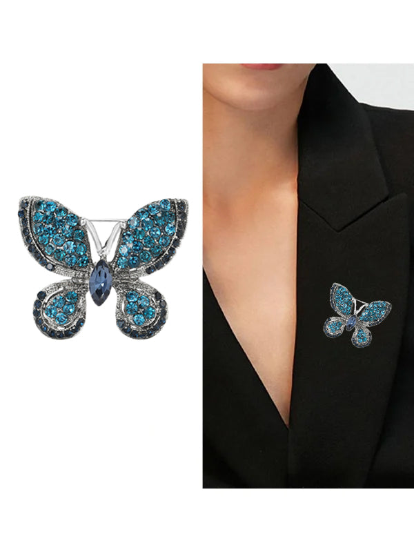 Exquisito broche de aleación con diamantes de imitación y mariposa
