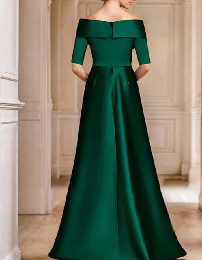 Robe longue en satin vert nouée à épaules dénudées