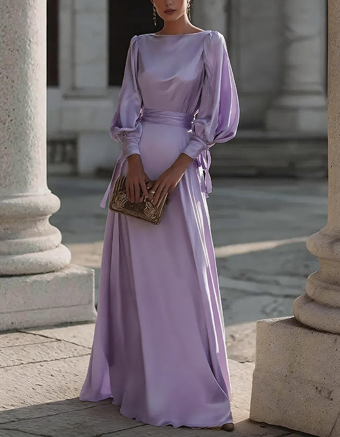 Vestido largo de satén color champán con mangas abullonadas