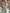Blue Background With Iridescent Floral Halter Neck And Cinched Waist Maxi Dress