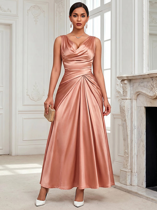 Vestido largo con cuello de satén rosa y pasta de judías rojas, con cintura retorcida