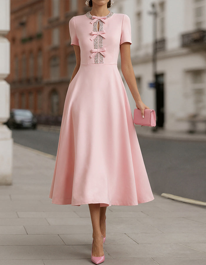 Pink Satin With Rhinestone Bow Cinching The Waist Midi Dress