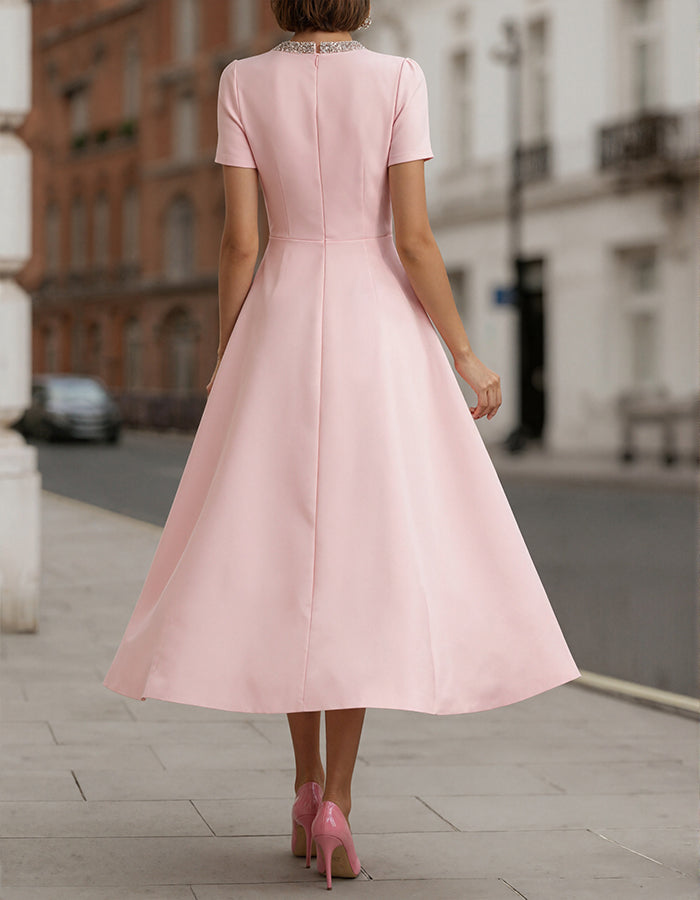 Pink Satin With Rhinestone Bow Cinching The Waist Midi Dress