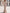 Nude Deep V Pearl Fringe Rhinestone Beaded Evening Gown