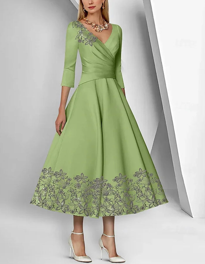 Graceful Satin Tea-Length Dress with Embroidered Floral Accents and 3/4 Sleeves