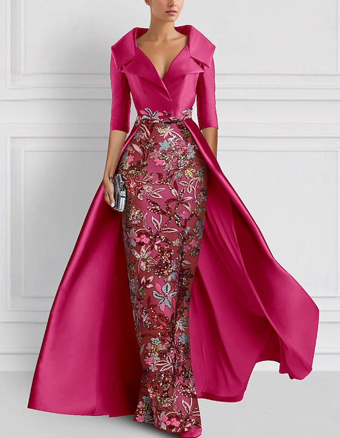 Vestido largo con flores bordadas en la solapa