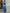Sophisticated Sapphire Blue Satin Dress with Knot Detail and Flutter Sleeves