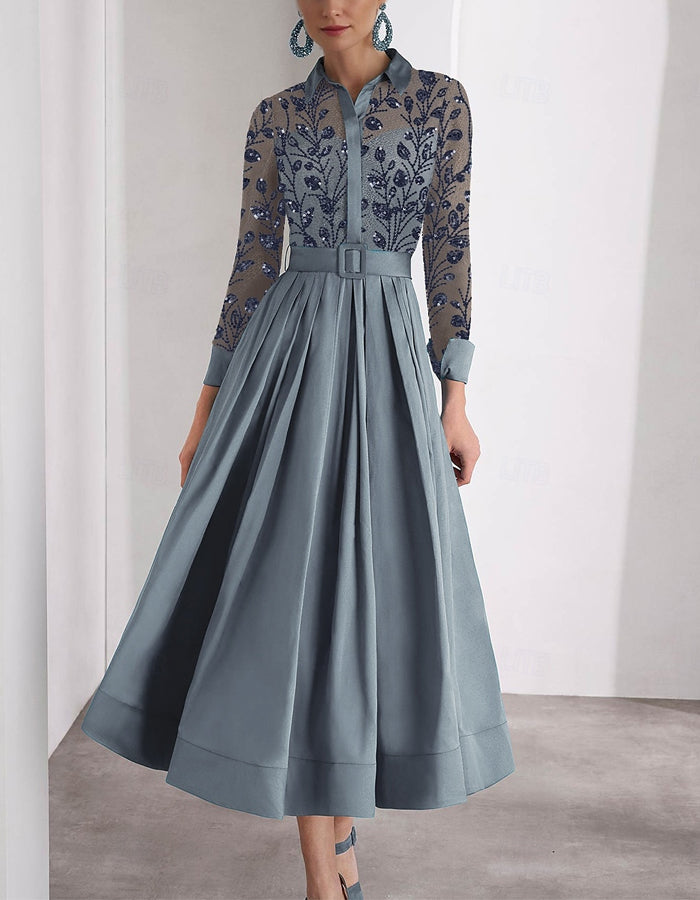 Robe mi-longue brodée à manches longues et col en satin