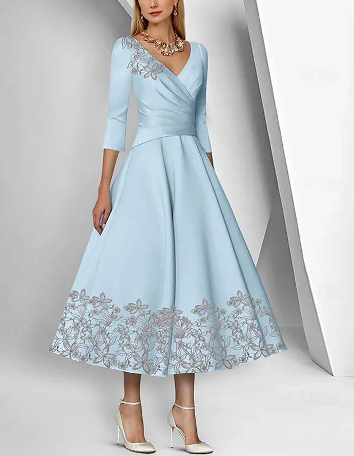 Graceful Satin Tea-Length Dress with Embroidered Floral Accents and 3/4 Sleeves