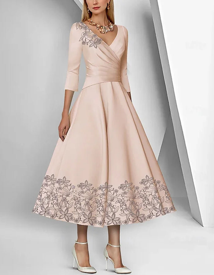 Graceful Satin Tea-Length Dress with Embroidered Floral Accents and 3/4 Sleeves