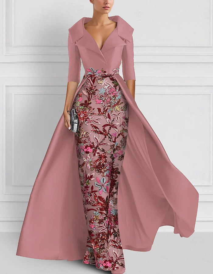 Vestido largo con flores bordadas en la solapa