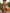 Radiant Orange Chiffon Gown with Painterly Print and Flared Sleeves