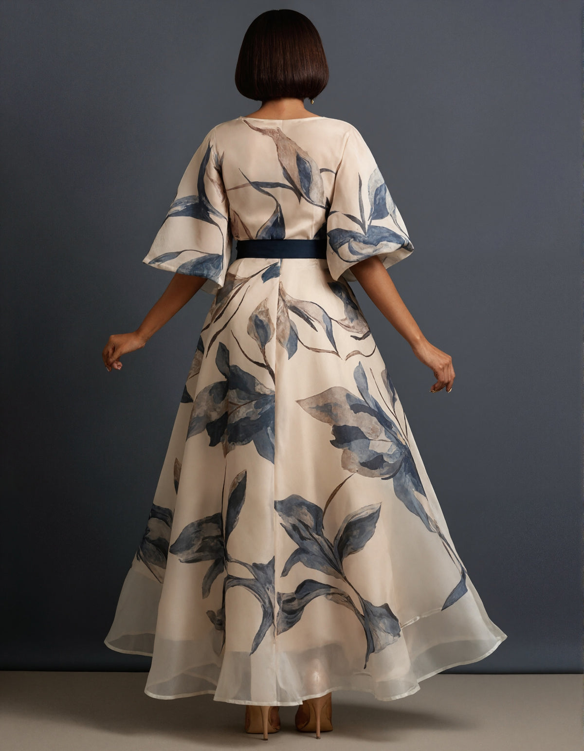 Elegant Navy Floral Organza Gown with High-Low Hem and Sash Belt