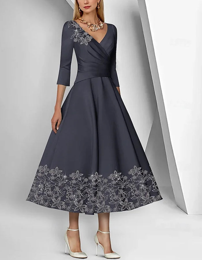 Graceful Satin Tea-Length Dress with Embroidered Floral Accents and 3/4 Sleeves