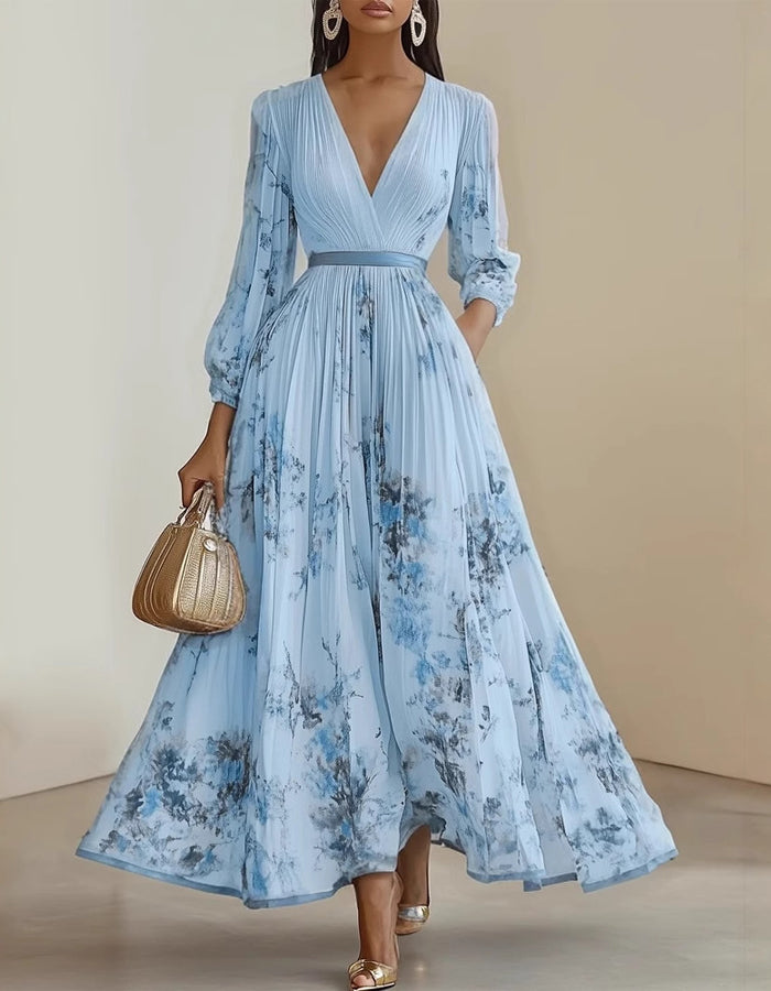 Elegante vestido de gasa color crema con estampado floral de acuarela y falda plisada