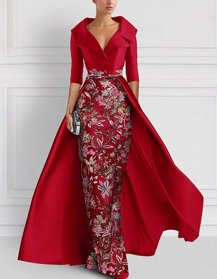 Vestido largo con flores bordadas en la solapa