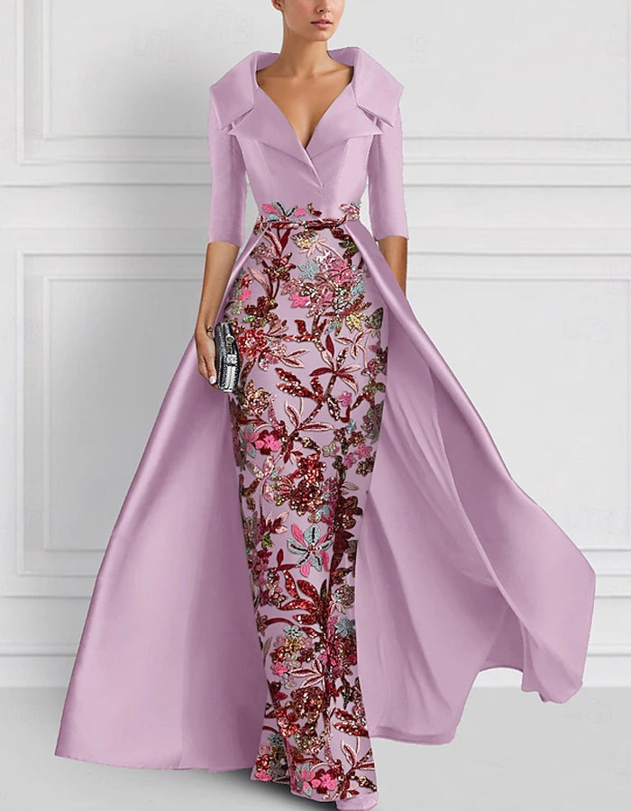 Vestido largo con flores bordadas en la solapa